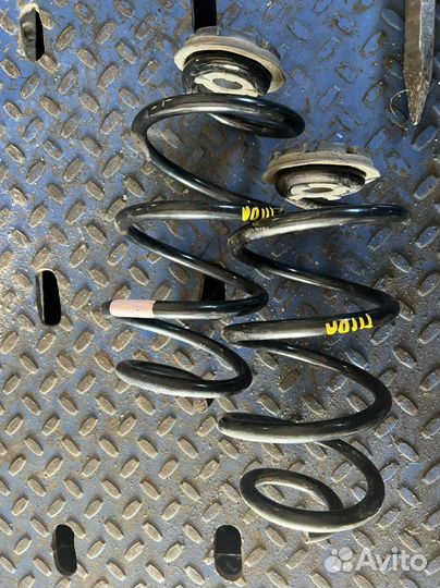 Пружина задняя Nissan Tiida левый руль