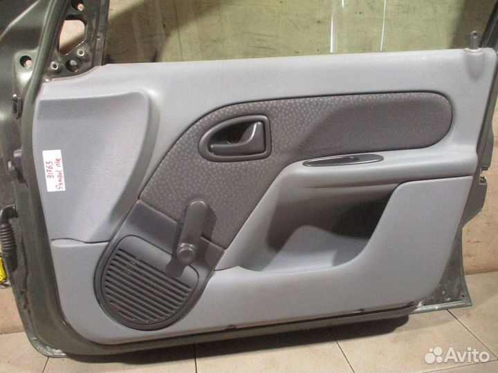 Обшивка двери передней правой Renault Symbol 1