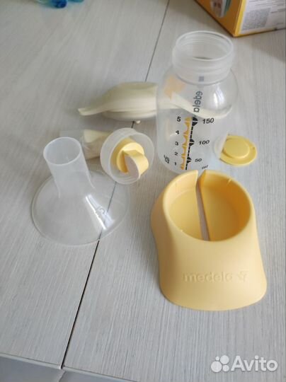 Молокоотсос medela ручной
