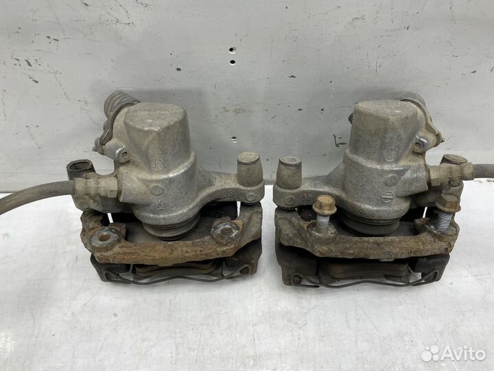 Суппорт задний левый / правый Mazda 3 BL 1.6