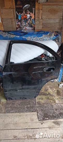 Дверь задняя левая Nissan almera classic