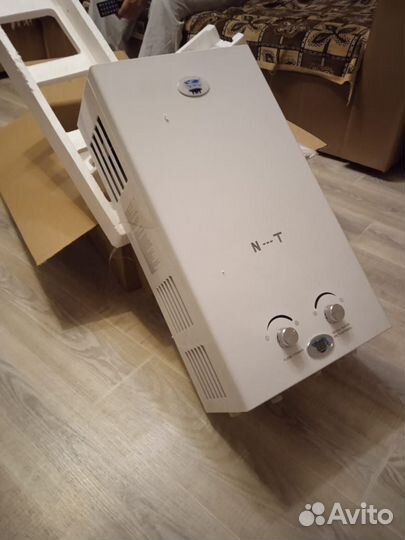 Газовая колонка, водонагреватель новая Нева