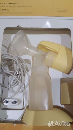 Молокоотсос medela электрический