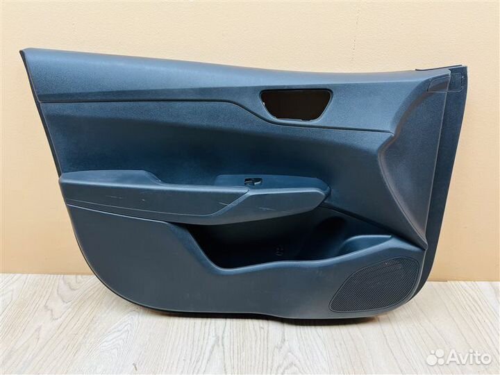 Обшивка двери передняя левая Hyundai Solaris 2