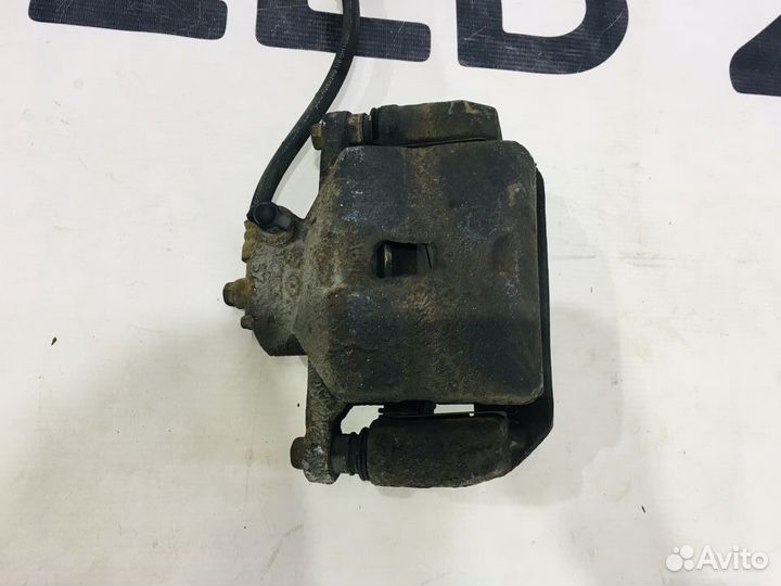 Суппорт тормозной передний левый Kia ceed 2 JD