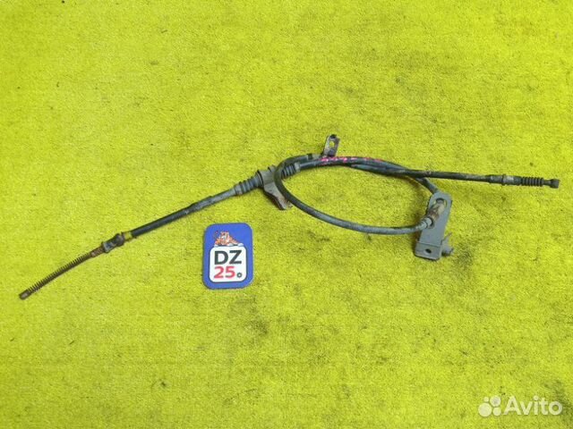 Тросик ручника задний левый Mitsubishi