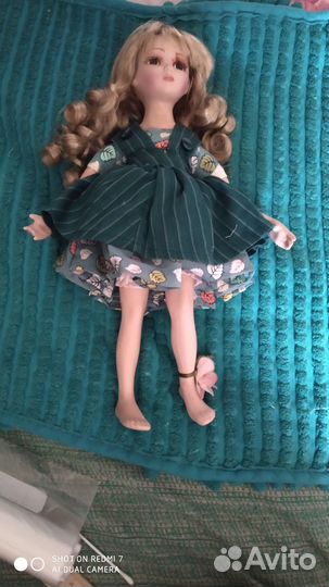 Кукла фарфоровая