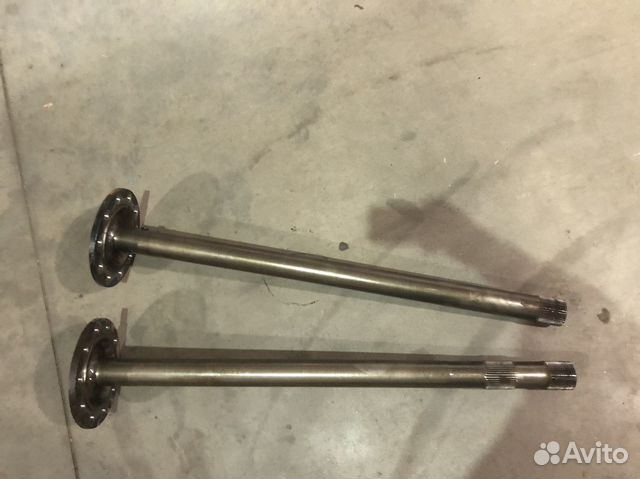Вал оси задней