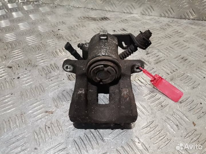 Суппорт тормозной задний правый Skoda Roomster