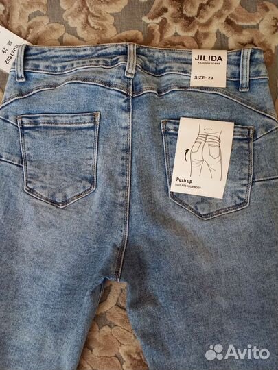 Джинсы новые