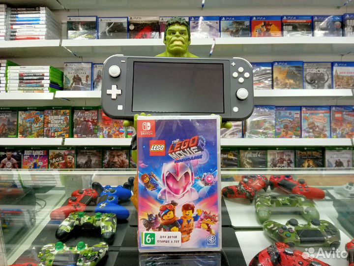 Nintendo Switch Lite Grey + lego Movie 2 Videogame