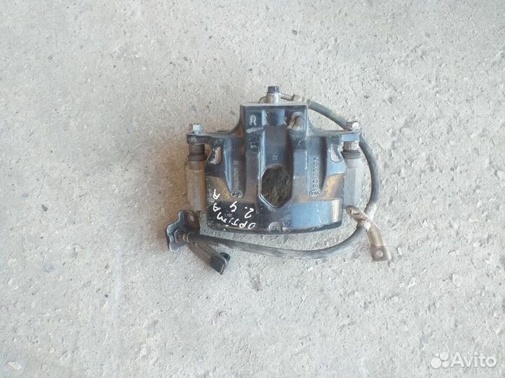 Суппорт передний правый Kia Optima 3 TF 2012 год