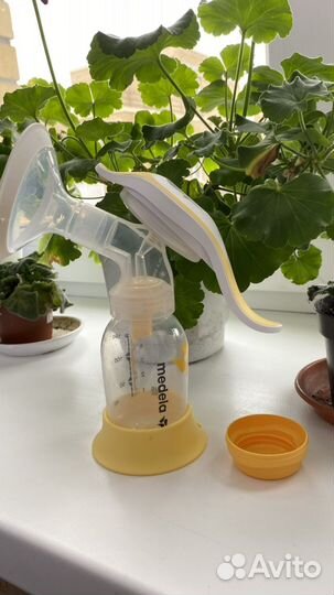 Молокоотсосник medela ручной
