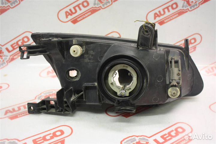 Фара левая Nissan