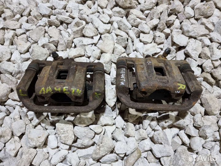 Суппорт задний Лачетти