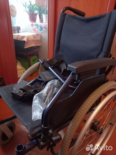Инвалидная коляска