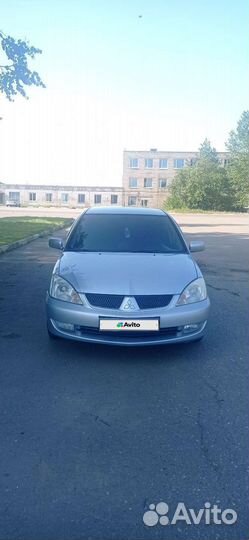 Mitsubishi Lancer 1.6 МТ, 2006, 294 335 км