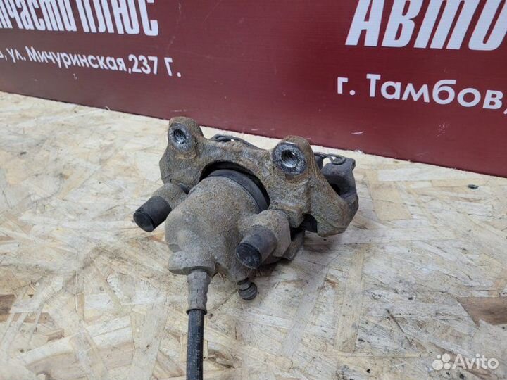 Суппорт тормозной передний левый Renault Logan