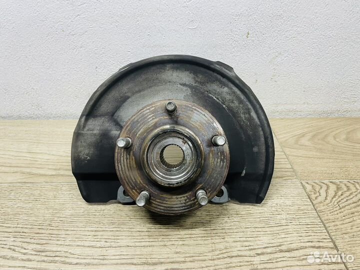 Кулак правый передний Mitsubishi Lancer 10