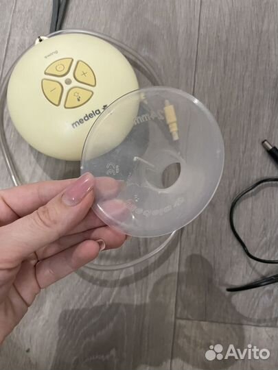 Молокоотсос medela электрический