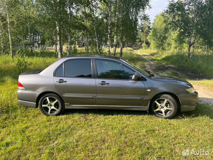 Mitsubishi Lancer 1.6 МТ, 2005, 300 000 км