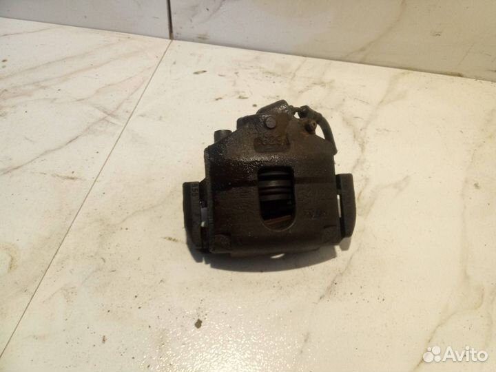 Суппорт тормозной передний левый Ford Fusion рест