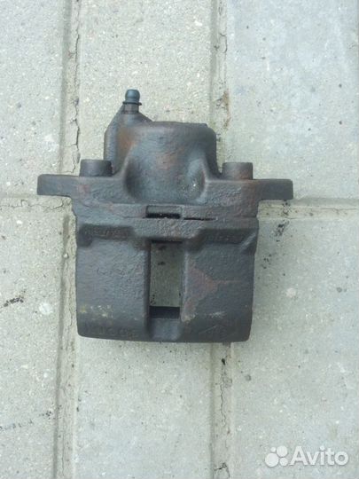 Суппорт тормозной передний Рено Логан 1