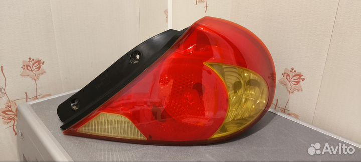 Задняя правая фара Киа spectra