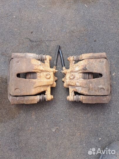 Суппорт тормозной передний Opel Corsa C