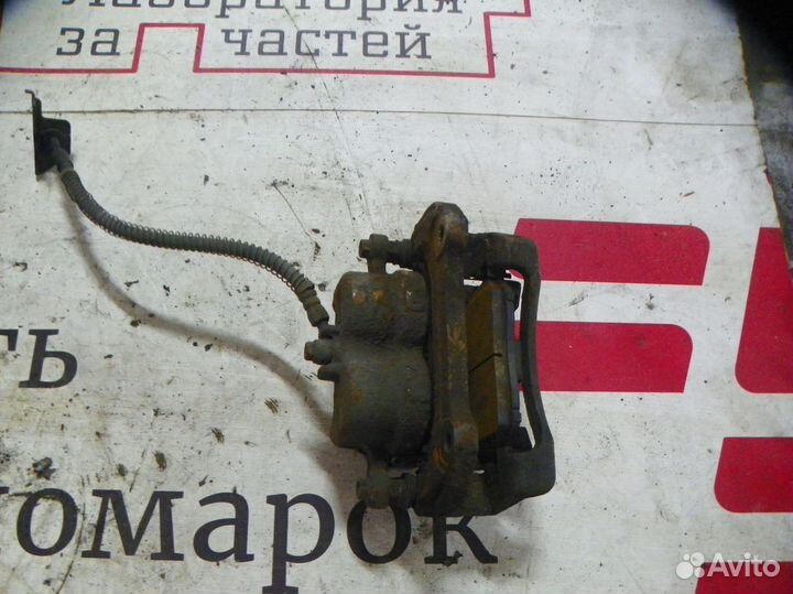 Суппорт тормозной передний левый Hyundai Santa Fe