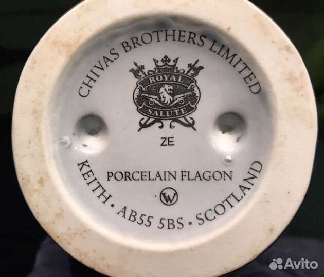 Пустая бутылка в мешочке от виски