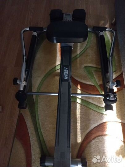 Гребной тренажер