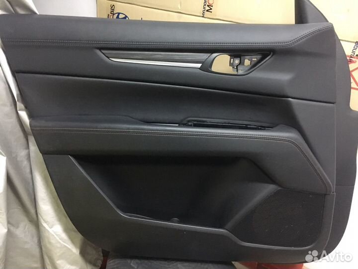 Внутренняя обшивка передней левой двери Mazda CX-5