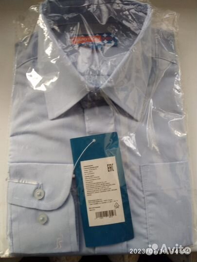 Новые рубашки (2) для мальчика школьного возраста