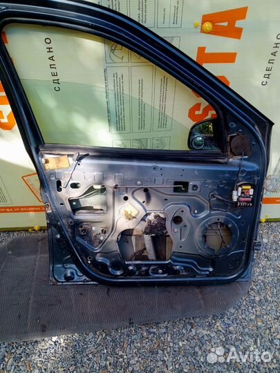 Передняя левая дверь Renault Logan 1