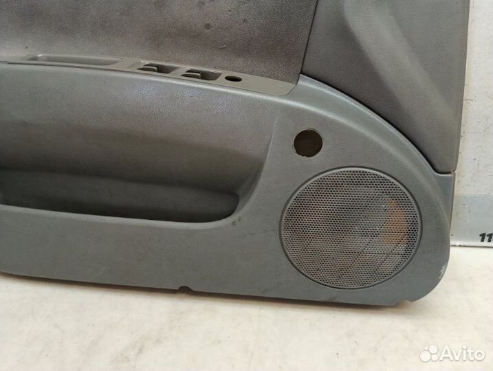 Обшивка двери передняя левая Chevrolet Lacetti