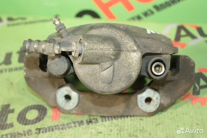 Суппорт тормозной mazda demio DY3W передний левый