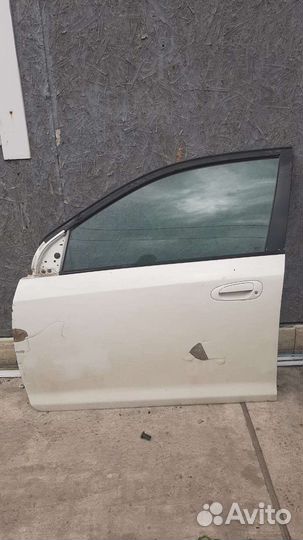 Дверь передняя левая