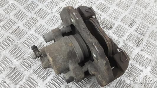 Суппорт тормозной передний правый mazda 3 1 (7LV28