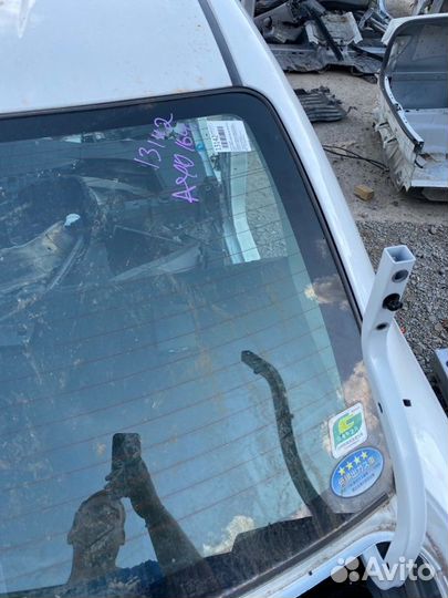 Стекло заднее Toyota Corolla Axio NZE164 1NZ-FE