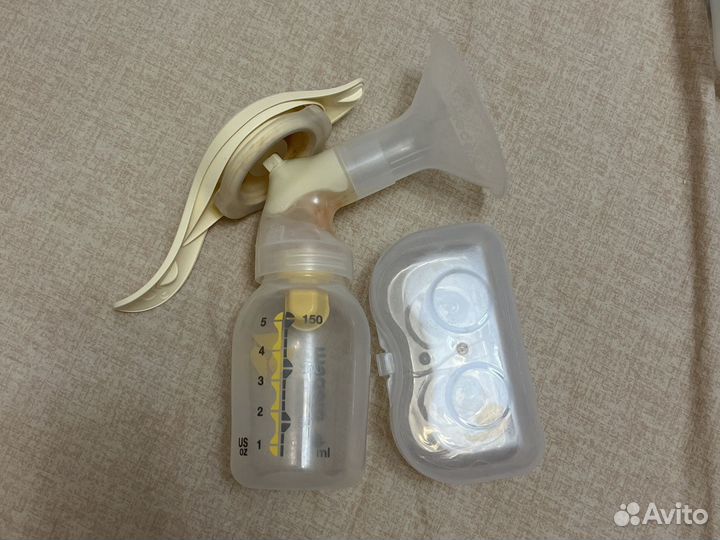 Молокоотсос medela ручной