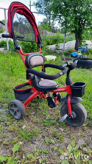 Трехколесный велосипед с ручкой