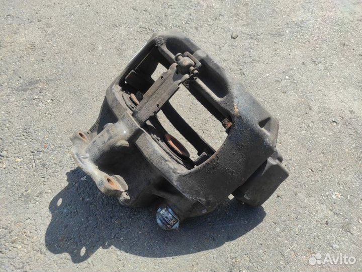 Суппорт тормозной передний левый Man Tgx