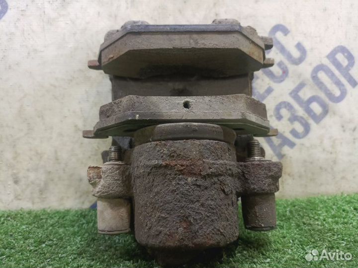 Суппорт передний правый Skoda Octavia седан 1.4