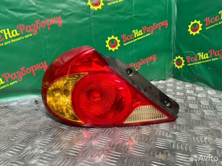 Фонарь левый Kia Spectra седан 1.6 2004