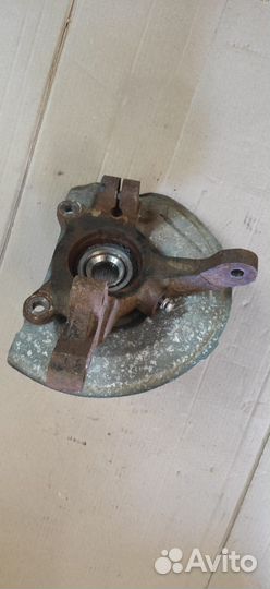 Поворотный кулак со ступицей Mitsubishi Outlander