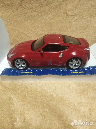Nissan,игрушка новая модель металлическая,1:24