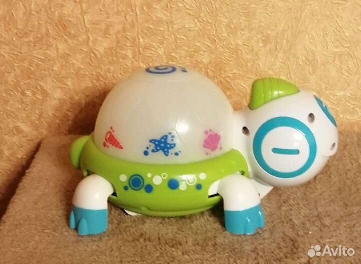 Игрушка каталка Черепаха музыкальная