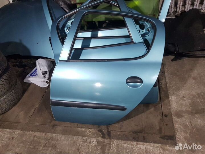 Двери Peugeot 206
