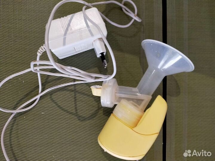 Молокоотсос medela электрический